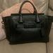 Coach Bags | Coach Swagger Pebbled Leather Medium Black | Color: Black | Size: Os