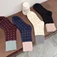 Neue Frauen Socken Baumwolle gemischte Farbe Mode japanischen Stil lange lose Socken Retro Punkte