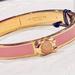 Coach Jewelry | Coach Hinged Bangle Bracelet | Color: Gold/Pink | Size: Os