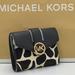 Michael Kors Bags | Michael Kors Carmen Medium Flap Bifold Faux Fur-Leather Wallet Black Color | Color: Black/White | Size: Os