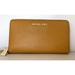 Michael Kors Bags | New Michael Kors Large Flat Phone Case Pebble Leather Marigold | Color: Gold | Size: Os