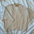 Urban Outfitters Sweaters | Cream Urban Outfitters Sweater Top With Cutout Neck Detailing Size Xs | Color: Cream/Tan | Size: Xs