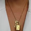 Louis Vuitton Jewelry | Authentic Louis Vuitton Padlock Necklace | Color: Gold | Size: Os