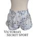 Victoria's Secret Shorts | Euc Victoria's Secret Sport Logo Design Floral Running Shorts Size Small | Color: Tan/White | Size: S