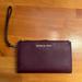 Michael Kors Bags | Maroon Leather Michael Kors Adele Leather Smartphone Wallet, Barely Used | Color: Purple | Size: Os