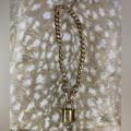 Louis Vuitton Jewelry | Louis Vuitton Lock & Key On Unbranded Gold Chain Bracelet | Color: Gold | Size: Os