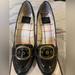 Coach Shoes | Coach Hillory Gold Buckle Black Glossy Pumps Heels Patent Leather 10b Italy Made | Color: Black/Gold | Size: 10