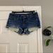 American Eagle Outfitters Shorts | American Eagle Ae Lace Pocket Peekaboo Denim Jean Short Shorts 2” Inseam Size 2 | Color: Blue | Size: 2