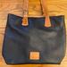 Dooney & Bourke Bags | Dooney & Bourke Black And Tan Tote Bag | Color: Black/Tan | Size: Os