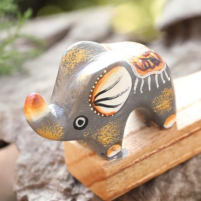 'Handcrafted Elephant-Themed Grey Jempinis Wood Door Stopper'