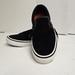 Vans Shoes | Classic Black And White Slip-On Vans Unisex Sneakers M5.5, Women's 7.5 | Color: Black/White | Size: 5.5