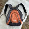 The North Face Bags | Mini The North Face Backpack | Color: Black/Orange | Size: Os