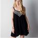 American Eagle Outfitters Dresses | American Eagle Outfitters Embroidered Swing Dress Size Xs/Tp Sleeveless | Color: Black/Gold | Size: Xs