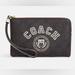 Coach Bags | *New* Coach Cb855 Women's Zip Wristlet In Signature Canvas W/ Varsity Motif | Color: Brown | Size: Os