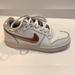 Nike Shoes | Nike Womens Ebernon Low Casual Shoes White And Rose Gold Sneakers | Color: Gold/Silver | Size: 7