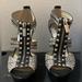 Michael Kors Shoes | Michael Kors Zip Front Snakeskin Heels | Color: Black/Silver | Size: 6