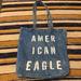 American Eagle Outfitters Bags | American Eagle Logo Denim Jean Tote Bag Distressed Cotton | Color: Blue | Size: Os