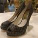 Michael Kors Shoes | Michael Kors Black/Gold Metallic Peep Toe Platform Size 7 M Heel Height 4.5” | Color: Black/Gold | Size: 7