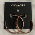 Coach Jewelry | Coach Hoop Earrings | Color: Gold | Size: Os