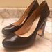 Nine West Shoes | Nine West .. Size 8 Blk Leather Gold Wedge Heel 5 Inch | Color: Black | Size: 8