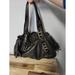 Michael Kors Bags | Michael Kors Collection Leather Black Gold Ring Hobo Drawstring Tassle Bag | Color: Black/Gold | Size: Os