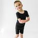 Solid Black Two-Piece Short Sleeve & Shorts Pajama Set - 4T