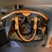 Louis Vuitton Bags | Authentic Louis Vuitton Tivoli Bag In Monogram Print Pm. Really Good Condition. | Color: Brown | Size: Os