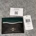 Coach Bags | Coach Signature Slim Id Credit Card Holder Pine Green/Brown Nwt Dark Pine Ch415 | Color: Brown/Green | Size: Os