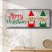 The Holiday Aisle® Christmas Elf Couple Framed On Canvas Print Canvas, Solid Wood in Blue/Red | 8 H x 20 W x 1.5 D in | Wayfair