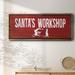The Holiday Aisle® Santa's Workshop Framed On Canvas Textual Art Canvas, Solid Wood in Red/White | 12 H x 30 W x 1.5 D in | Wayfair