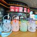 Hesroicy 1100ml Straw Cup Strap Design Bright Color Flip Lid Colorful Print Double Drinking Straw Cup for Students