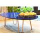 Oval coffee table in blue gloss colour with black hairpin legs