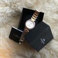 Coach Accessories | Coach Two Tone Watch With Halo Of Faux Diamonds | Color: Gold/Silver | Size: Os
