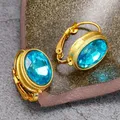 Boucles d'oreilles créoles ovales en métal doré vintage pour femmes incrustées de charbon bleu