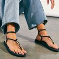 Free People Shoes | Free People Caroline Cali Sandal Black Leather Flat Braided Thong Size 40 | Color: Black | Size: 40eu