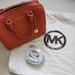Michael Kors Bags | Nwot Michael Kors Mercer Pebbled Leather Orange Crossbody Duffle Satchel Bag | Color: Gold/Orange | Size: Os