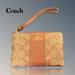 Coach Bags | Coach 58035 Corner Zip Wristlet Signature Light Khaki Saddle Leather Nwt | Color: Red | Size: Os