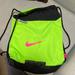 Nike Bags | Nike Neon Green With Pink Emblem Drawstring Backpack. Front Zipper-Unisex | Color: Black/Green | Size: Os