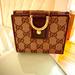 Gucci Bags | Gucci Brown Monogram Logo Canvas And Leather Compact Abbey Wallet Preowned | Color: Brown | Size: Os