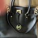 Michael Kors Bags | Michael Kors Hamilton Black Handbag With Shoulder Straps. 6736968 Tote Bag | Color: Black/Gold | Size: Os