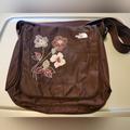 The North Face Bags | Brown Floral Northface Nylon Crossbody/Messenger Bag | Color: Brown/Orange | Size: Os