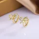 Boucles d'oreilles créoles à nœud pour femmes et filles bijoux d'oreille Huggies à double nœud