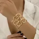Bracelet ouvert en forme de fleur pour femme bijoux métalliques couleur or doux ouverture
