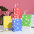 Sacchetti regalo con stampa di zampe di cane cucciolo manici di torsione di carta sacchetti regalo