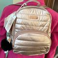 Jessica Simpson Bags | Jessica Simpson Mini Backpack Rose & Rose Gold Shimmer Quilted Puffer | Color: Pink | Size: 10”W X 10.5”H X 3”D