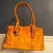 Dooney & Bourke Bags | Dooney & Bourke Handbag Golden Brown Embossed Large Crocodile - Guc | Color: Brown/Gold | Size: Os