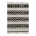 Tapis kilim ethnique tissé à franges et relief noir et blanc 80x150
