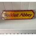 Buckfast Abbey Roadsign Famous Red & Yellow Logo Interpretation