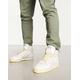 adidas Originals Rivalry 86 hi top trainers in white and grey