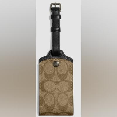 Coach Accessories | Coach Luggage Tag In Signature. Color Way Canvas Gunmetal Khaki. Brand New. | Color: Tan | Size: Os
